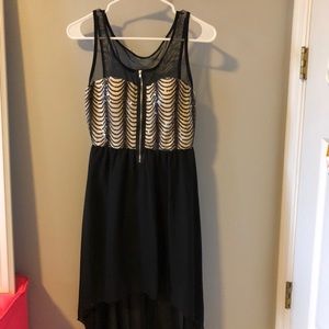 High to low black and cream colored dress